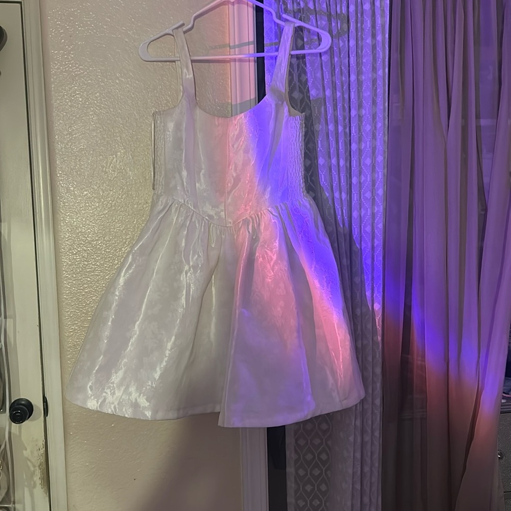 Stella Laguna Beach White graduation dress 
Satin white with embroidered flowers